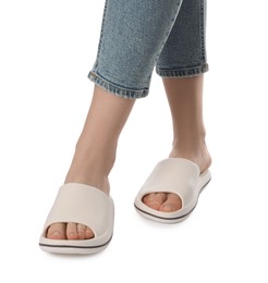 Photo of Woman in slippers on white background, closeup