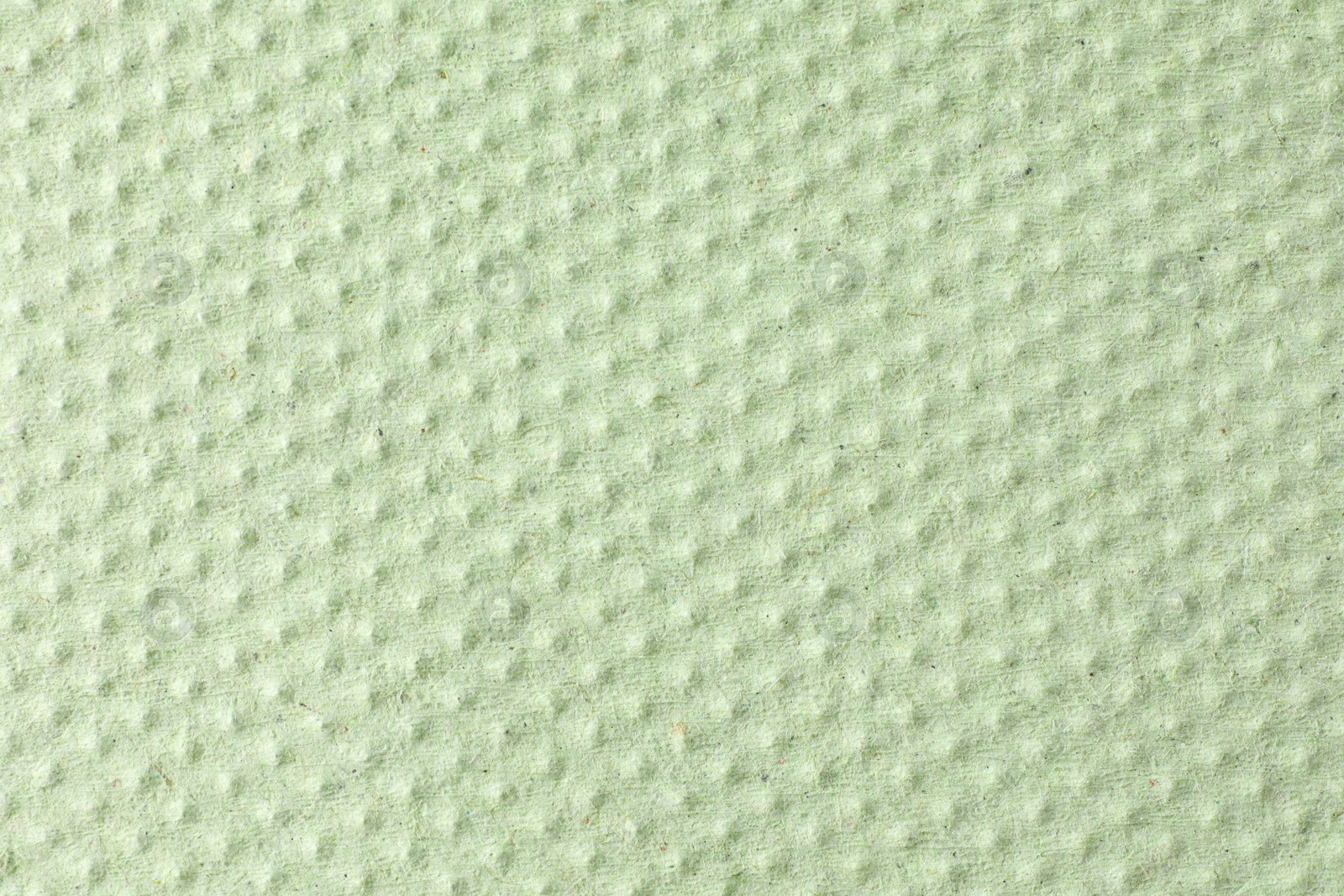 Photo of Texture of paper towel as background, closeup view