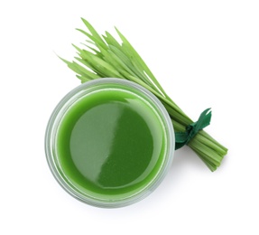 Photo of Glass of fresh wheat grass juice and sprouts on white background, top view