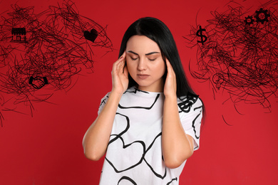 Image of Stressed young woman with mess in her head on red background