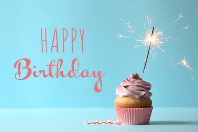 Image of Happy Birthday! Delicious cupcake with burning sparkler on blue background