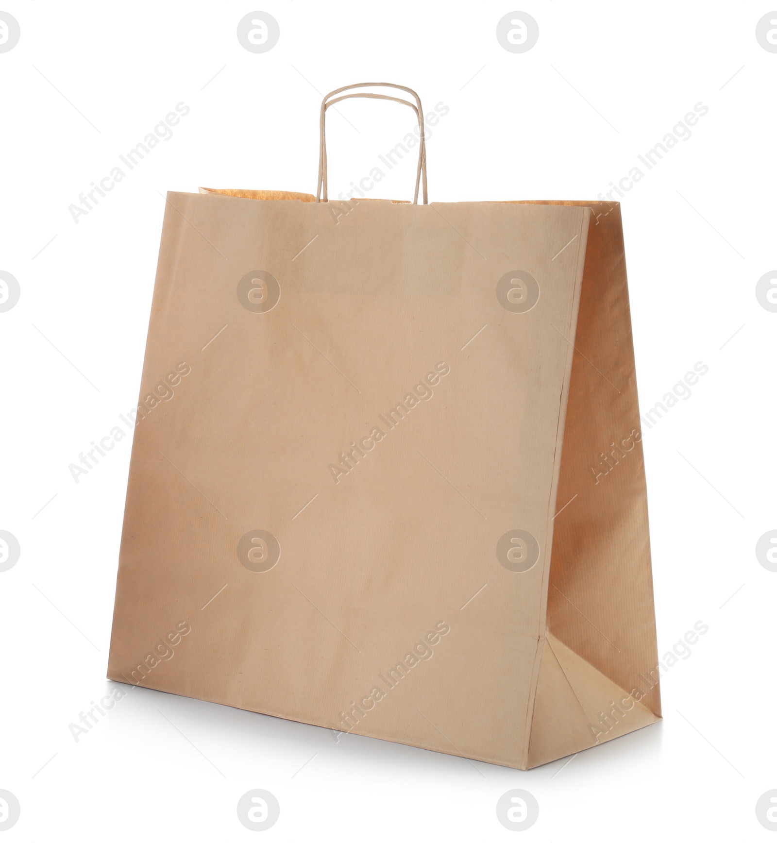 Photo of Mockup of paper shopping bag on white background