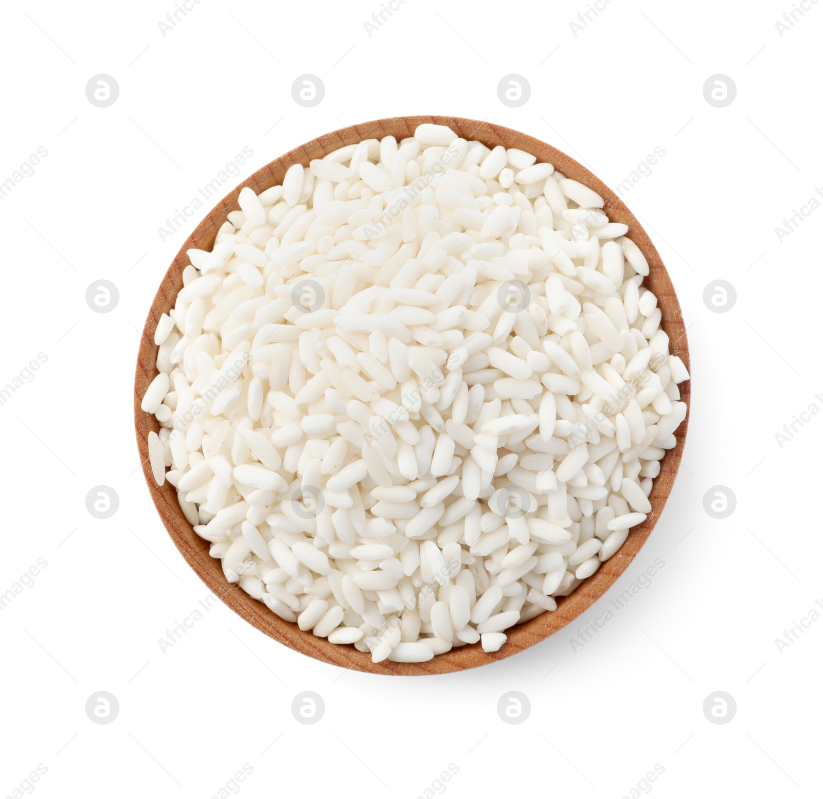 Photo of Bowl with raw rice isolated on white, top view