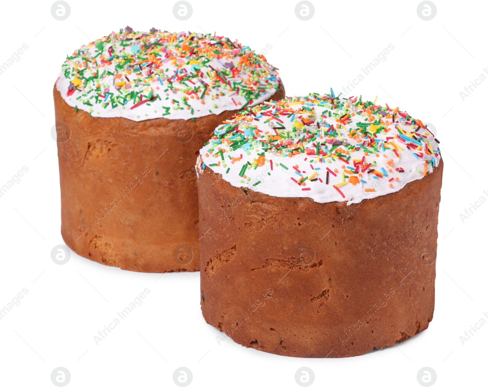 Photo of Traditional Easter cakes with sprinkles isolated on white