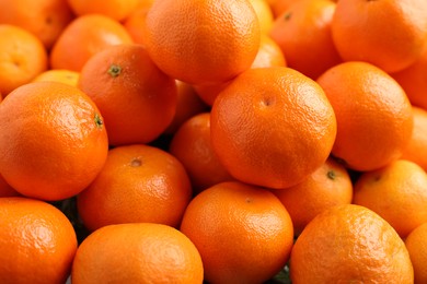Photo of Delicious fresh tangerines as background, closeup view