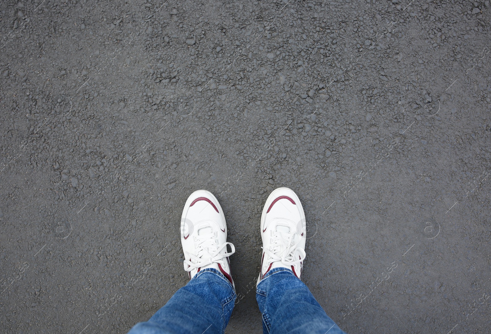 Photo of Man standing outdoors, top view. Space for text