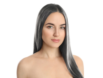Portrait of young woman with beautiful grey colored hair on white background