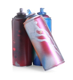 Photo of Different spray paint cans isolated on white