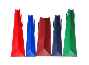 Colorful paper shopping bags isolated on white