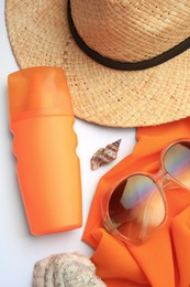 Photo of Flat lay composition with bottle of sunscreen on white background