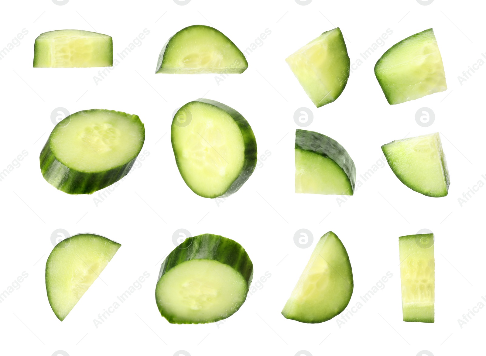 Image of Set of fresh cucumber slices on white background