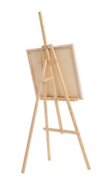 Photo of Wooden easel with canvas isolated on white