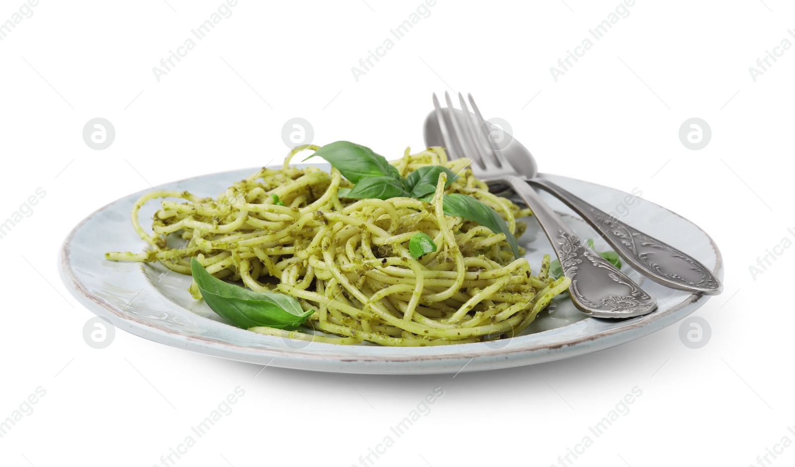 Photo of Delicious pasta with pesto sauce, basil and cutlery on white background