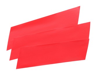 Pieces of red insulating tape isolated on white, top view