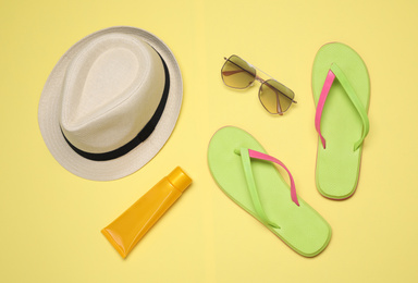 Flat lay composition with beach objects on background