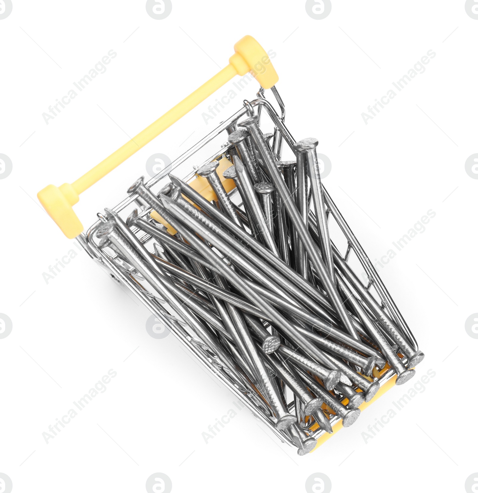 Photo of Metal nails in shopping cart isolated on white, top view