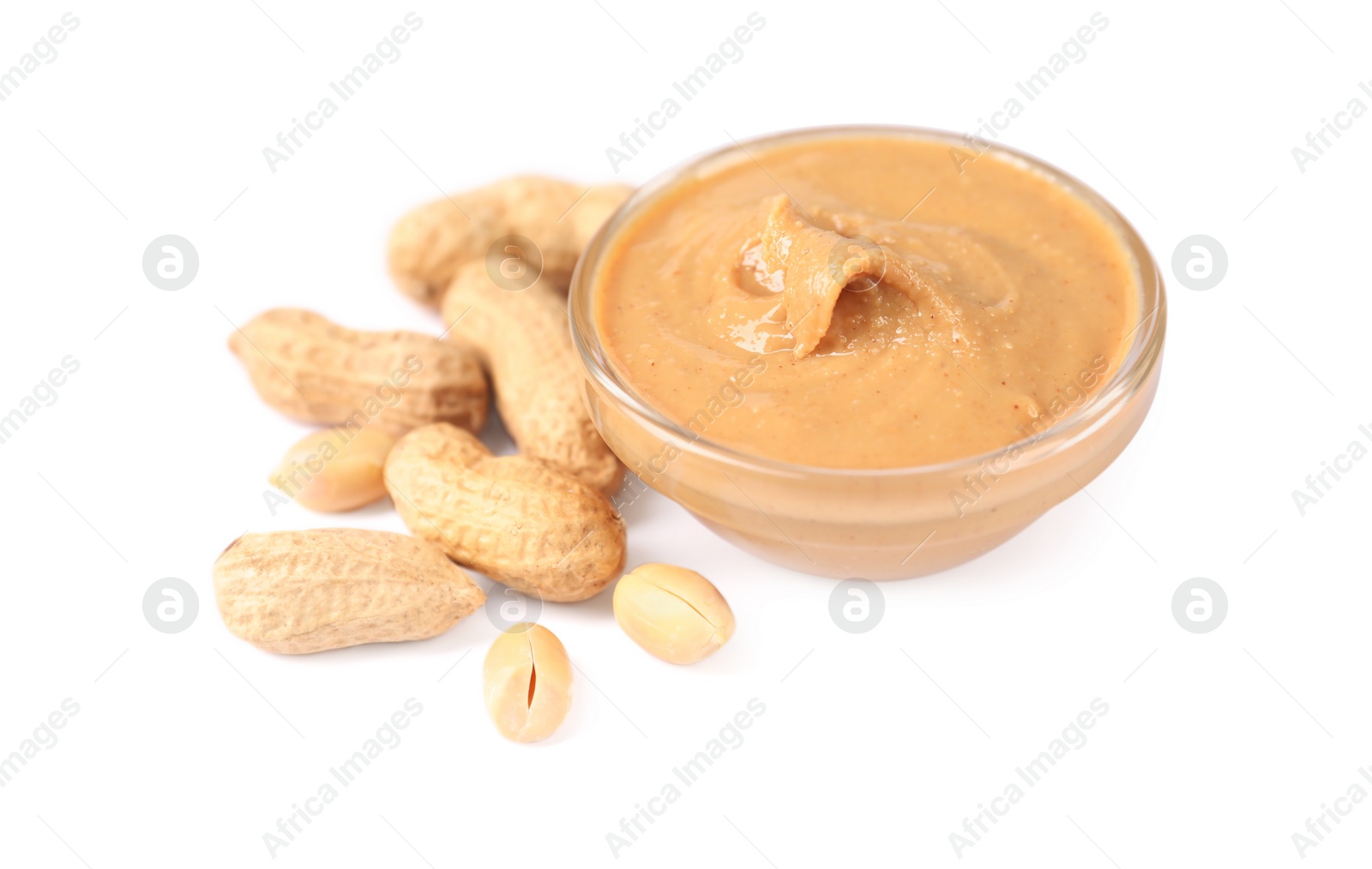 Photo of Delicious nut butter and peanuts isolated on white