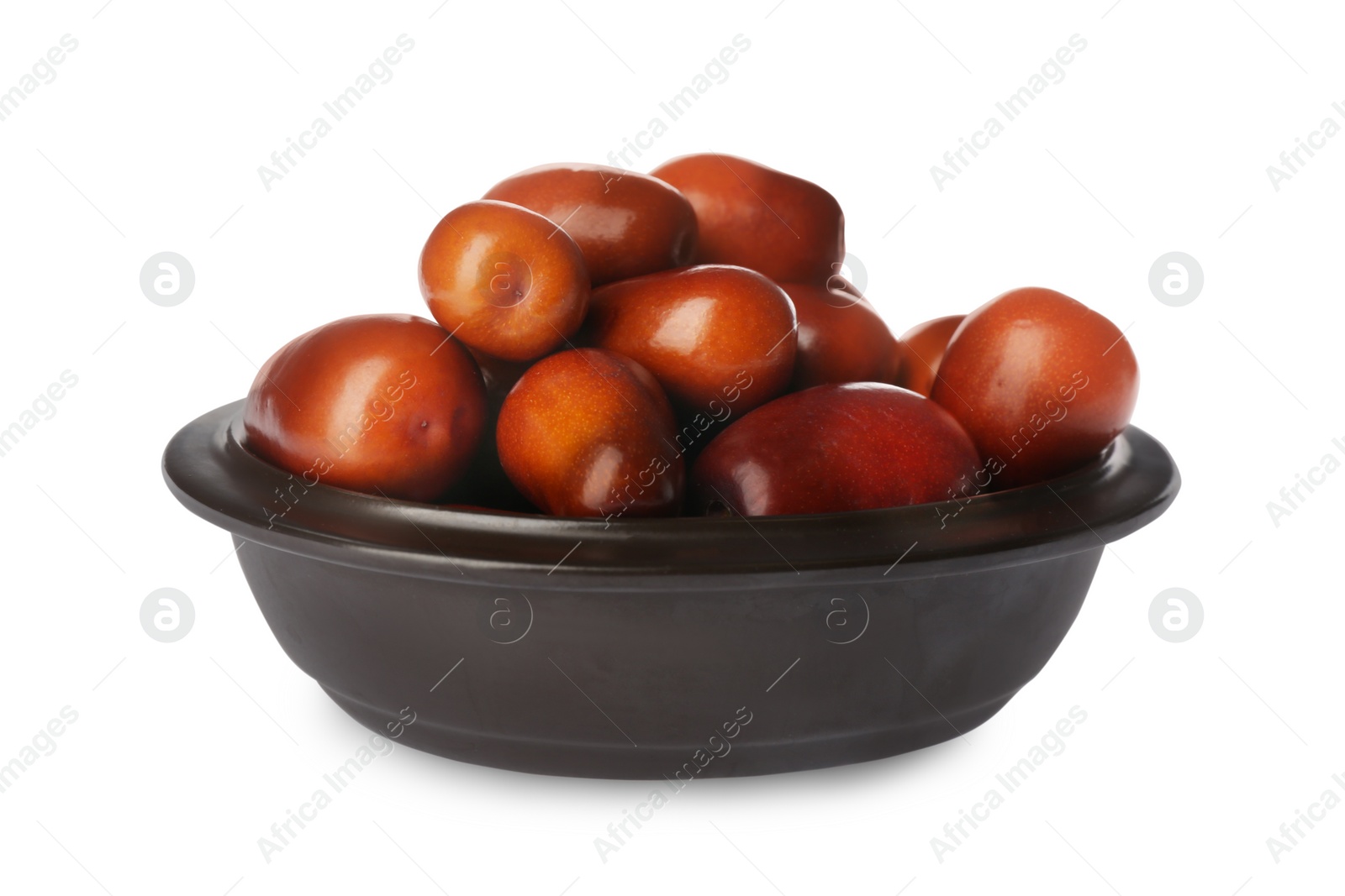 Photo of Fresh ripe oil palm fruits in bowl isolated on white