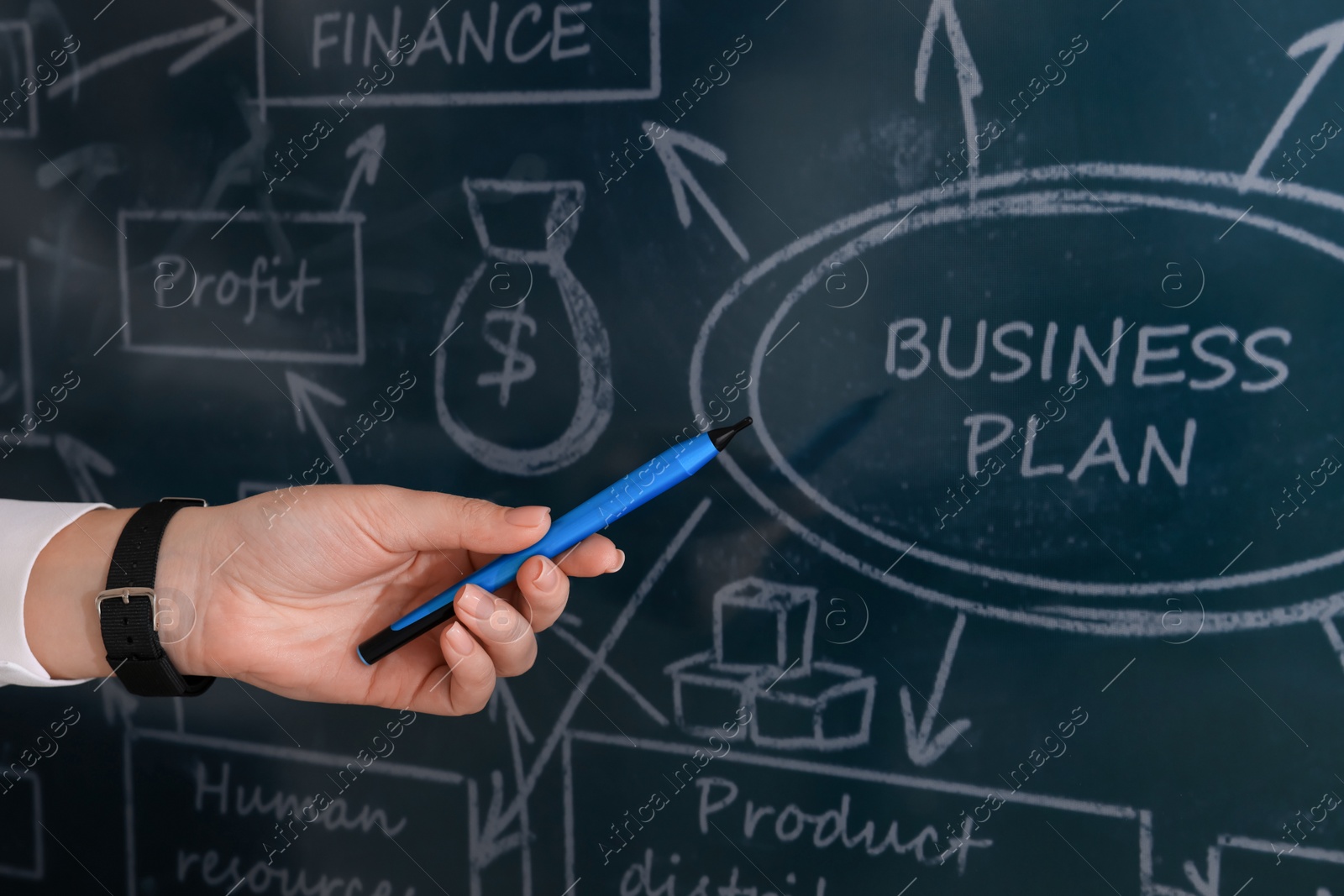 Photo of Business trainer with pen using interactive board, closeup