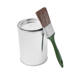 Can of paint and brush on white background