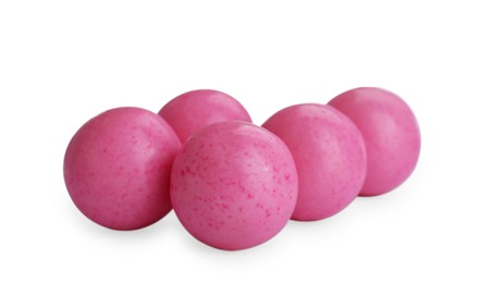 Bright pink chewy gumballs isolated on white