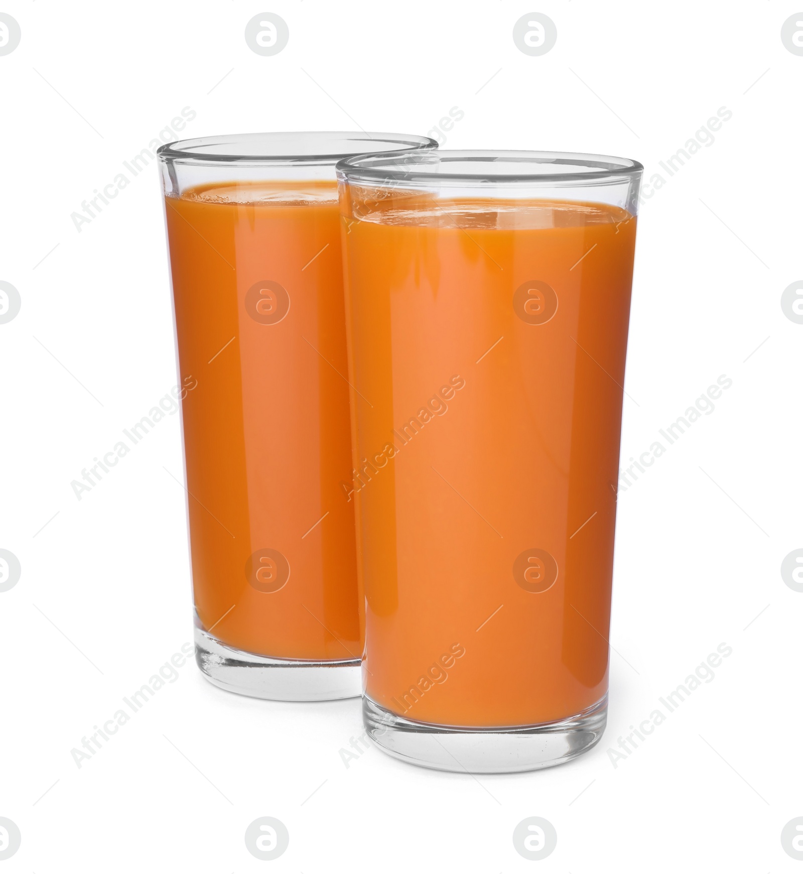 Photo of Two glasses of fresh carrot juice on white background