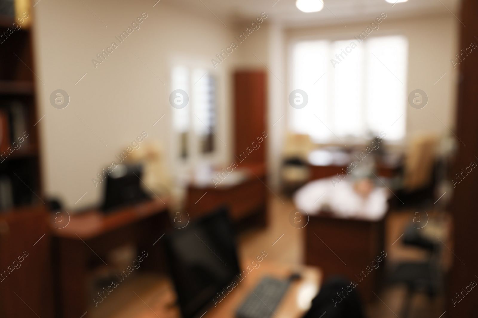 Photo of Blurred view of modern office interior. Bokeh effect