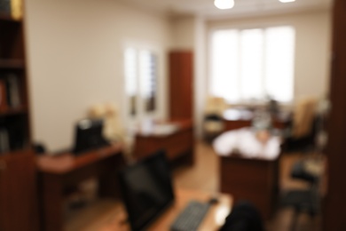 Photo of Blurred view of modern office interior. Bokeh effect