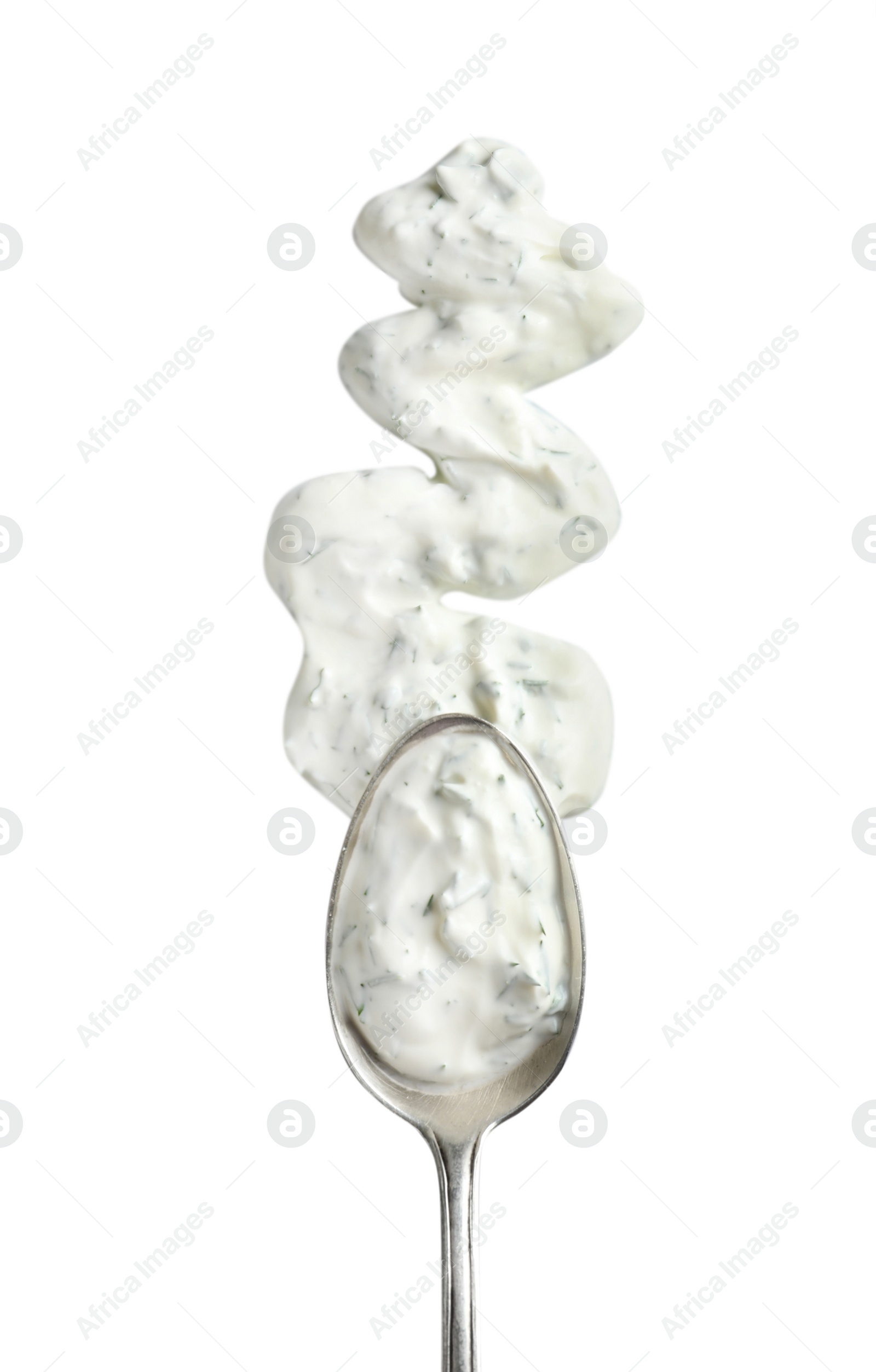 Photo of Delicious tartar sauce and spoon on white background, top view