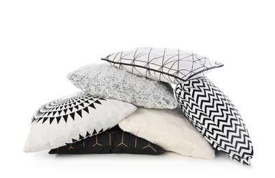 Photo of Pile of different colorful pillows on white background