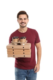 Young courier with pizza boxes and drinks on white background. Food delivery service