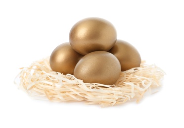 Golden eggs in nest on white background