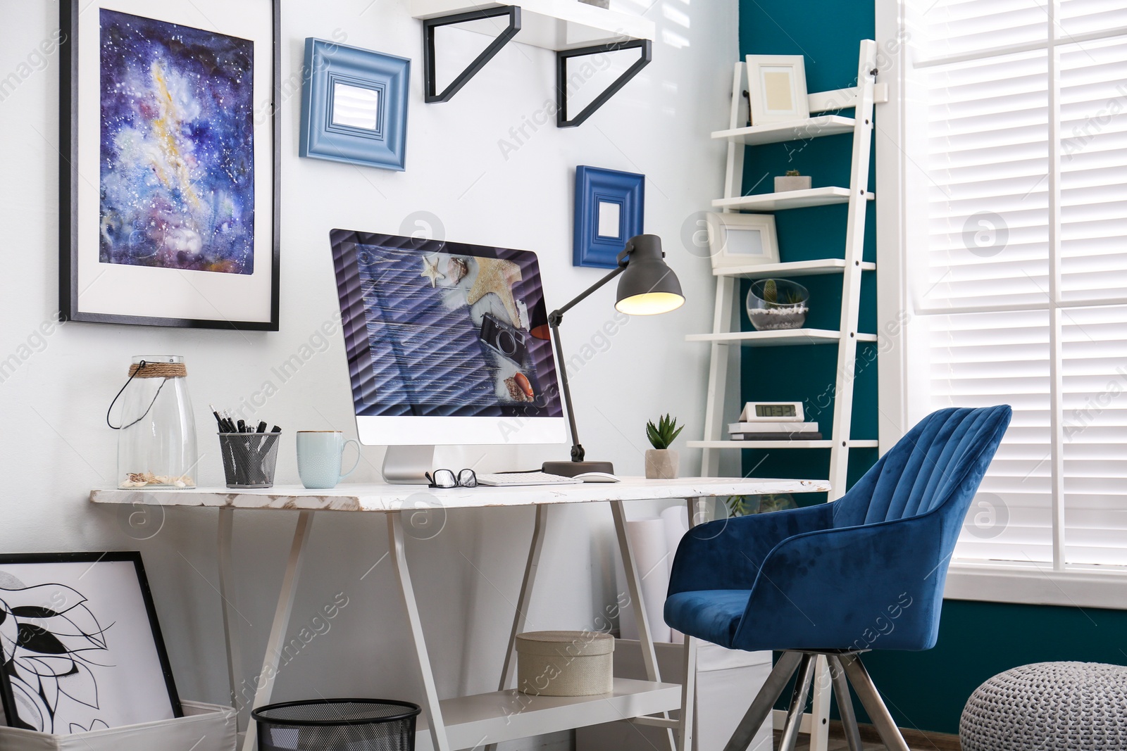 Photo of Home workplace with modern computer and desk in room