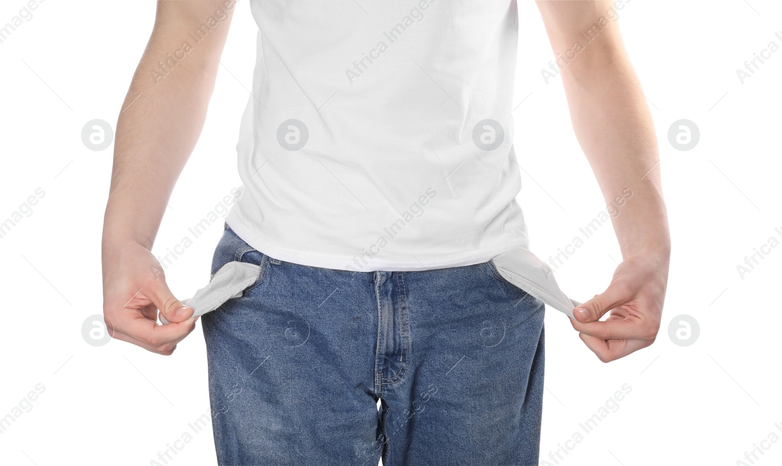 Photo of Poor man showing empty pockets on white background, closeup