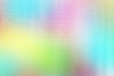 Image of Beautiful colorful foil as background, top view