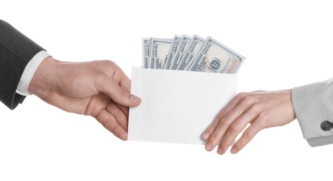 Photo of Money exchange. Man giving envelope with dollar banknotes to woman on white background, closeup