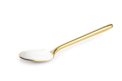 Spoon with tasty organic yogurt isolated on white