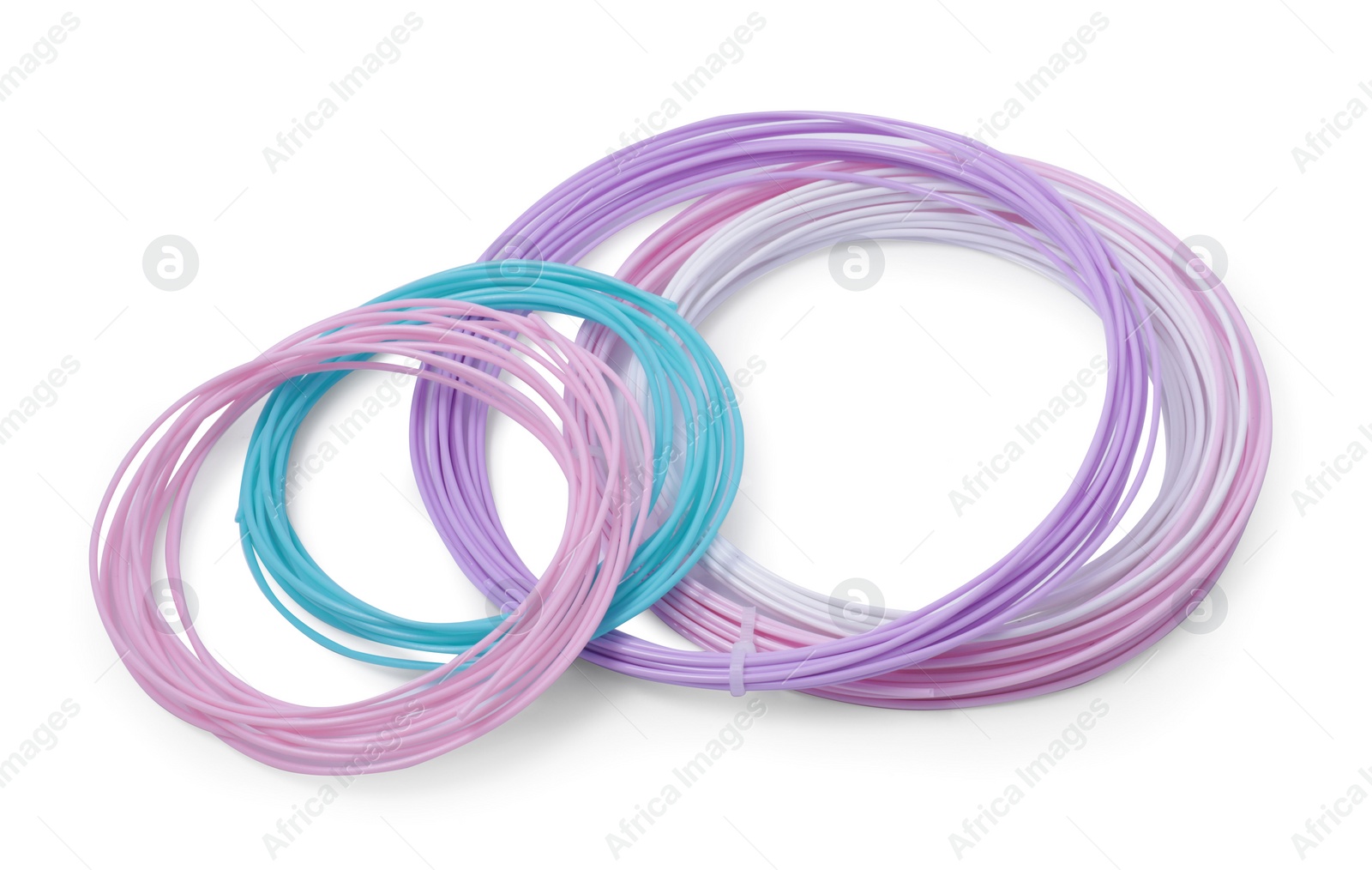 Photo of Colorful plastic filaments for 3D pen on white background