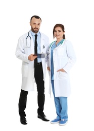 Full length portrait of doctors with clipboard isolated on white. Medical staff