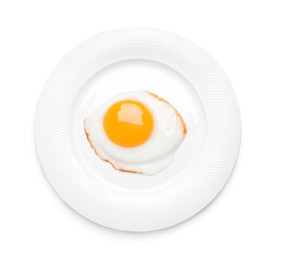 Photo of Plate with delicious fried egg isolated on white, top view