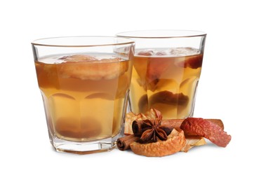 Photo of Delicious compot with dried apple slices and spices on white background