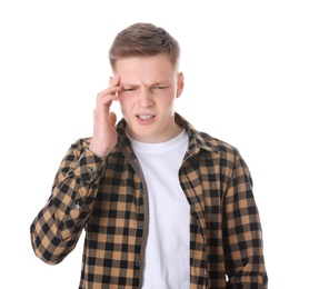 Photo of Teenage boy suffering from headache on white background