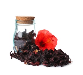Photo of Dry hibiscus tea in glass jar and beautiful flower on white background