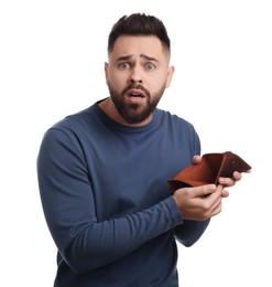 Photo of Confused man showing empty wallet on white background