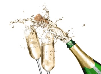 Image of Sparkling wine splashing out of bottle and glasses on white background