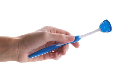 Photo of Woman holding tongue cleaner for oral care on white background, closeup