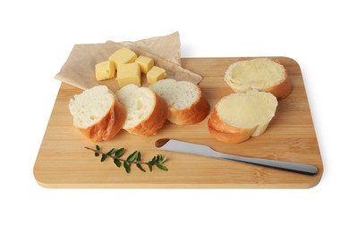 Photo of Wooden board with sliced baguette and fresh butter on white background