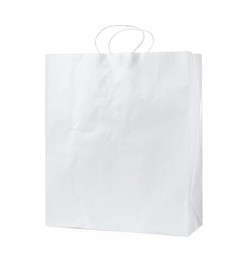 Photo of Empty shopping paper bag isolated on white