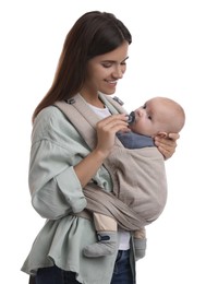 Photo of Mother holding her child in baby carrier on white background