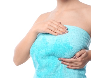 Photo of Woman checking her breast on white background, closeup